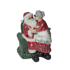 Imagem de PAPAI NOEL E MAMÃE NOEL SENTADO NA POLTRONA COR VERMELHO E VERDE DE RESINA COM GLITTER 20CM - CROSS  - Cross Comercial Ltda