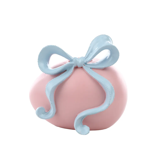 Imagem PORTA-VELAS OVO DA PÁSCOA ROSA COM LAÇO AZUL DECORATIVO DE RESINA 9X8X9CM - CROMUS
